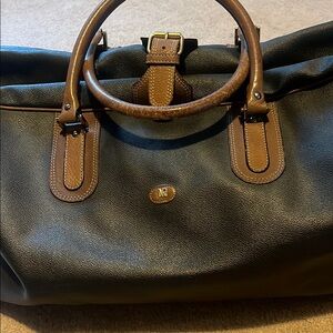 Nina Ricci Brown Travel Bag with Structured Design